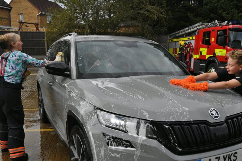 Stanground fire fighters and volunteers at their annual car wash at the Fire Station. Pictures: David Lowndes