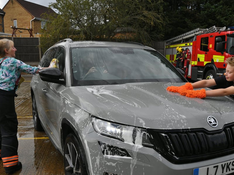 Stanground fire fighters and volunteers at their annual car wash at the Fire Station. Pictures: David Lowndes