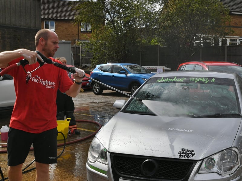 Stanground fire fighters and volunteers at their annual car wash at the Fire Station. Pictures: David Lowndes