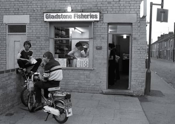 Chris Porsz's picture of Steven Zenczuk sitting on the wall outside Mick’s fish and chip shop in Gladstone Street... He went on to play in goal for Peterborough United.