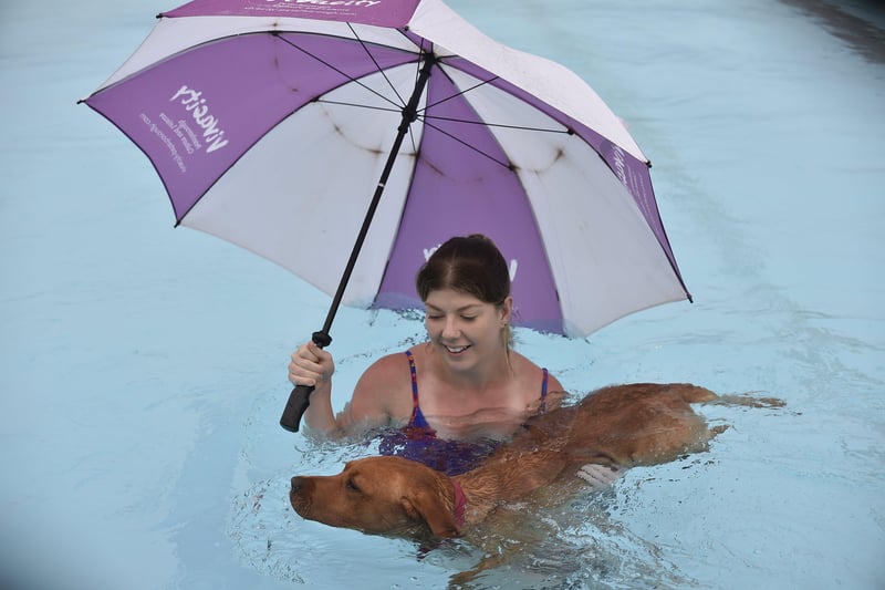 Dogswim at Peterborough Lido. Leonie Childs and Marvel EMN-210914-151744009