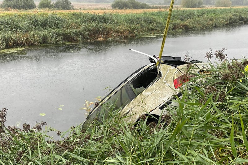 A white BMW was retrieved from water next to Twenty Foot Road in March.