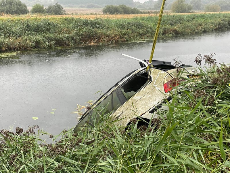 A white BMW was retrieved from water next to Twenty Foot Road in March.