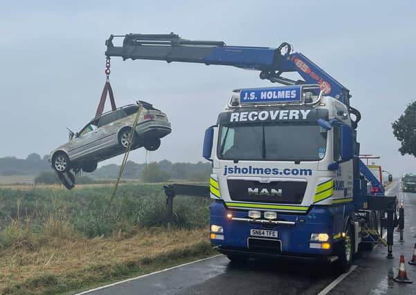 A white BMW was retrieved from water next to Twenty Foot Road in March.