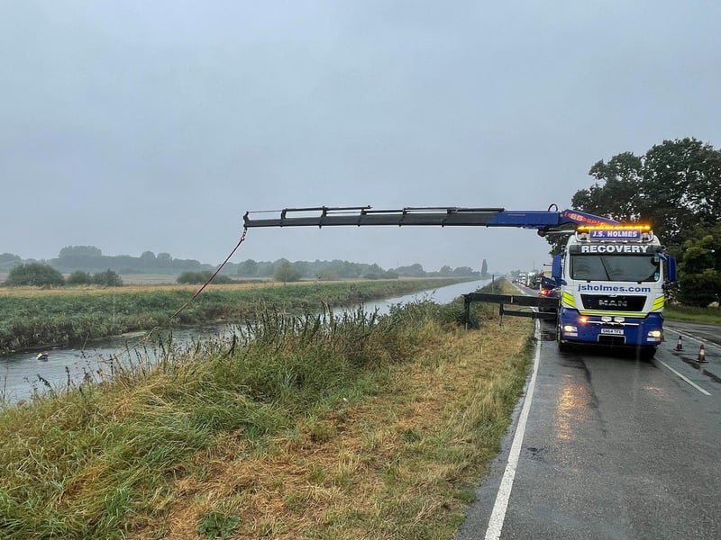 A white BMW was retrieved from water next to Twenty Foot Road in March.