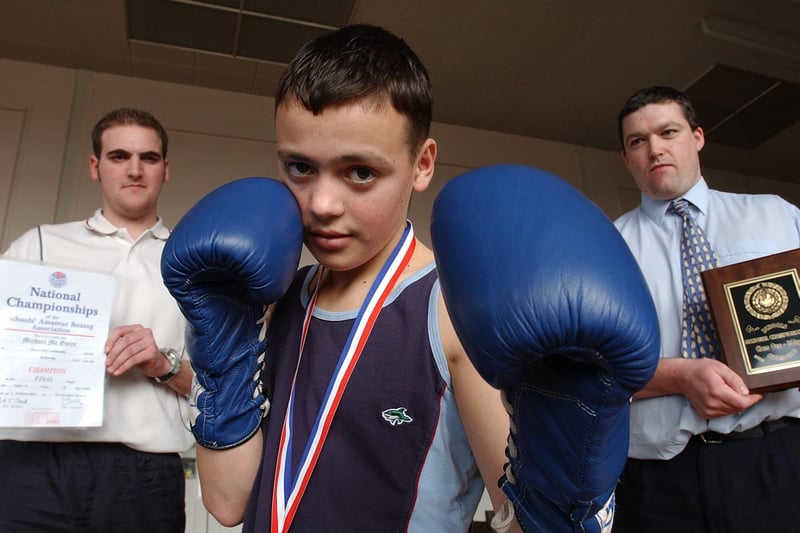 Michael Maguire [pictured aged 13]  was a schoolboy national boxing champion pictured back at Hereward Community College. Also poictured are teachers Steve Lilley and Charlie German.