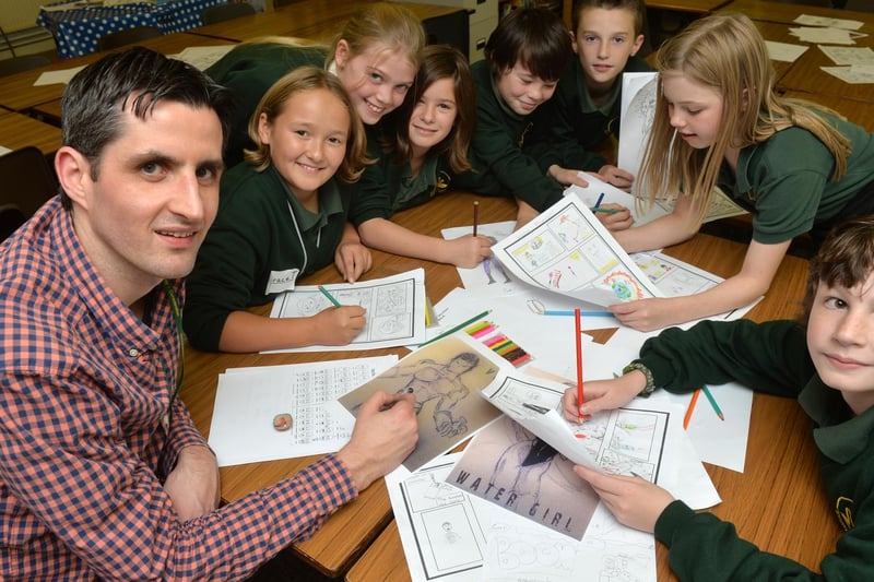 Illustrator and character animator Andrew Thompson with Sandye Place Academy pupils in 2013