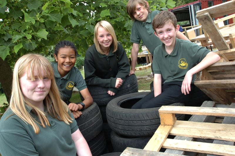 Eco warriors at Sandye Place Academy with some of the materials which are being recycled to build a school eco cabin in July 2013