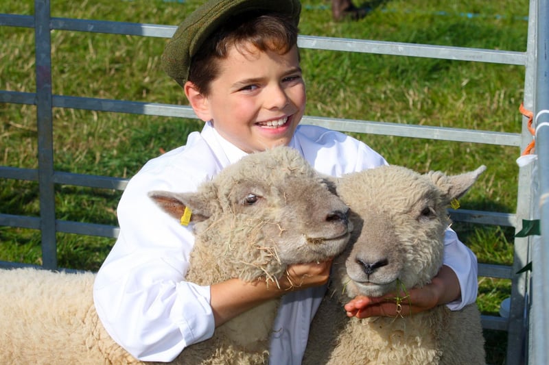 Matthew Holmes, 10, and sheep from the Nepcote flock