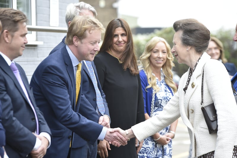 Peterborough MP Paul Bristow greets Princess Anne at Photocentric. EMN-210920-143045009