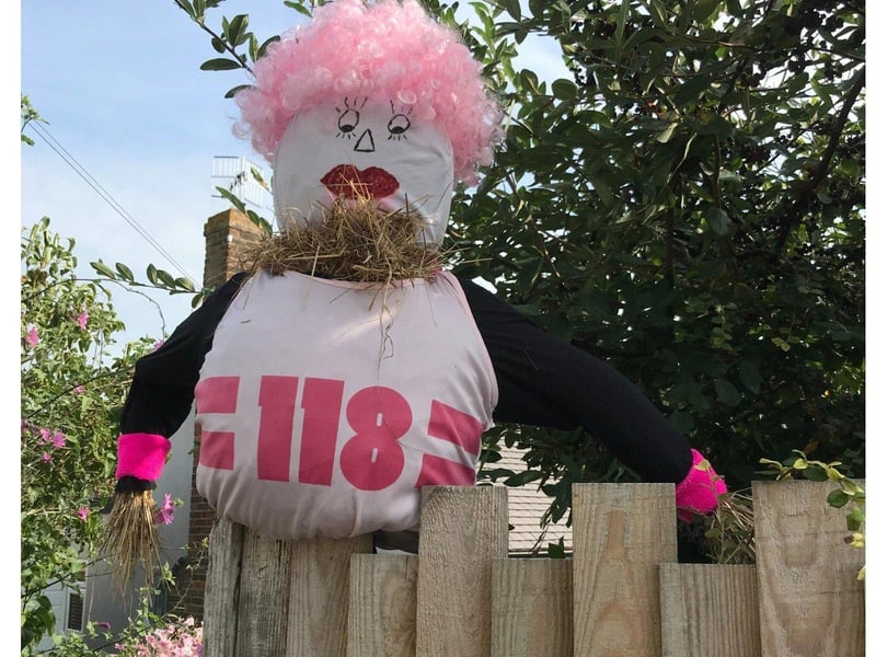 118 couldn't decide who's scarecrow was the best, so it's just sitting on the fence