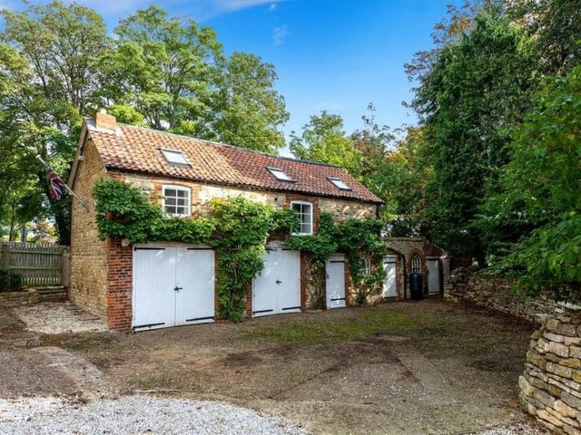 The detached former coach house.