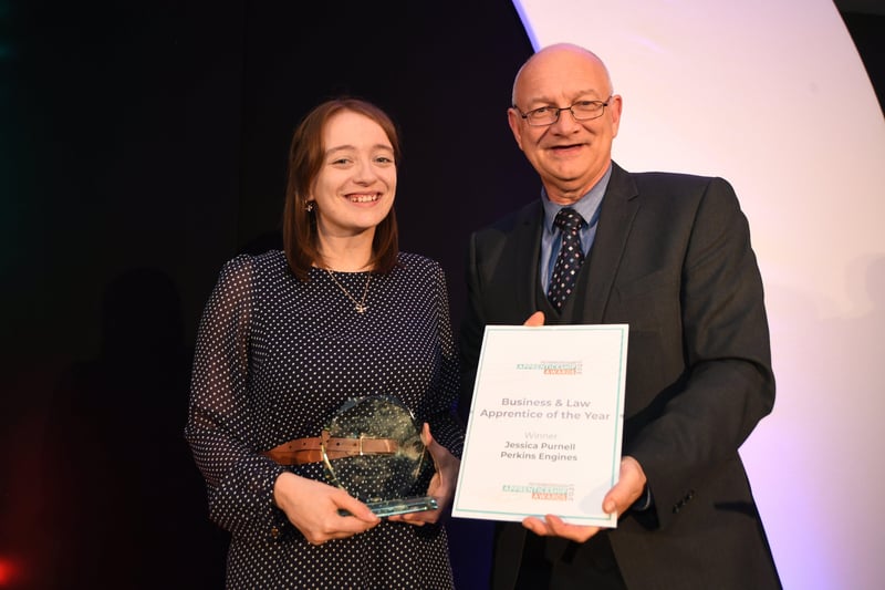 Peterborough Apprenticeship Awards 2021.  Business and Law Apprentice of the Year   Jessica Purnell from Perkins Engines with Mark Edwards. EMN-210925-005018009
