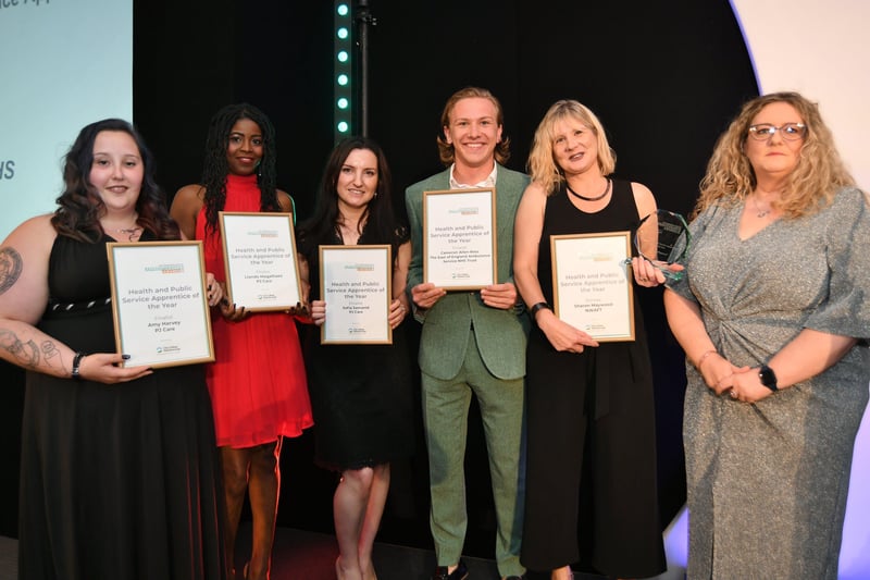 Peterborough Apprenticeship Awards 2021.  Health and Public Service Apprentice of the Year. Amy Harvey, Lando Magathaes, Sofia Samanidi, Cameron Allen-Ross and winner Sharon Maywood with a sponsor from City College Peterborough EMN-210925-005040009