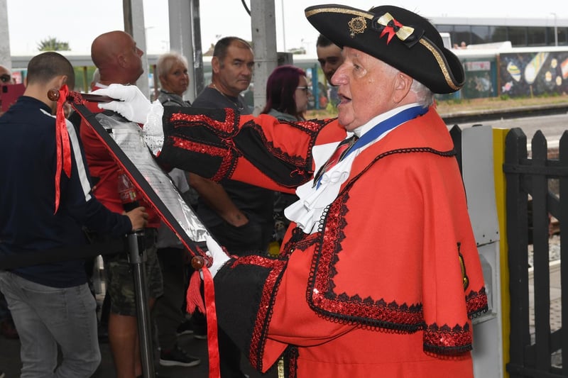 The Flying Scotsman's  arrival is announced by Mablethorpe Town Crier David Summers.