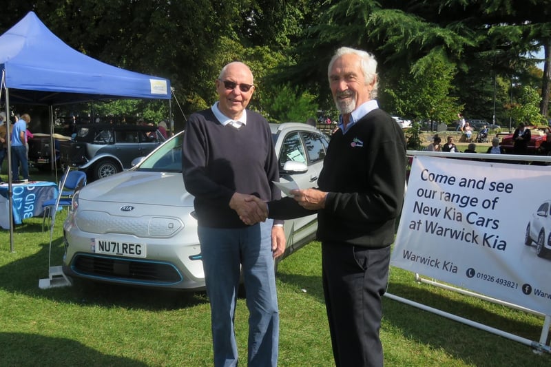 Terry Sparks (left), runner-up in the ‘Name the car’ competition, receives his prize from David Derbyshire of Warwick Kia.