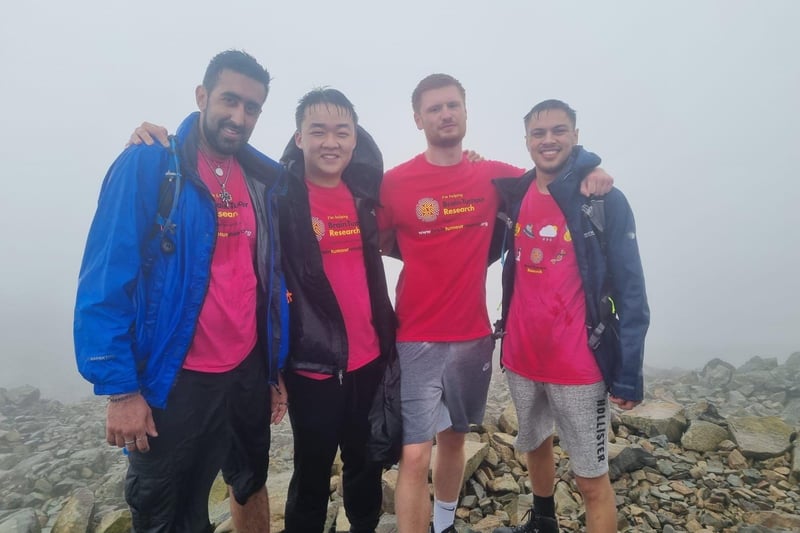 The first four to reach the top, TJ, Zhu, Zach and Stuart