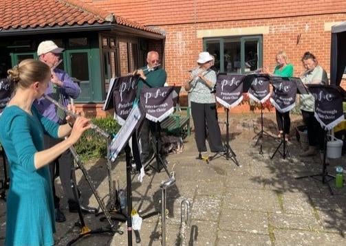 Peterborough's Flute Choir perform at the MacMillan Cancer Support charity event.