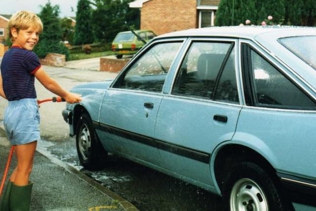 Paul Schneider - "This was me washing our much loved Aug 1, 1982 1.3 (4 speed manual), Suzie."