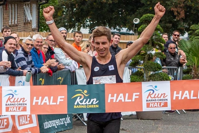 Paul Navesey, of City of Portsmouth AC, romps home to win the men’s half marathon