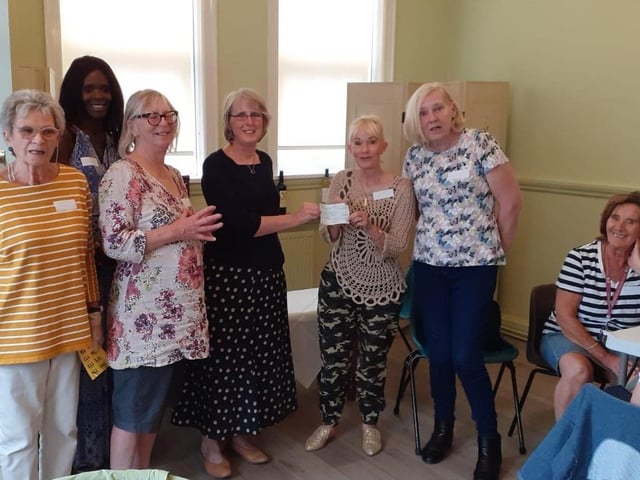 Members of BreatheEasy Eastbourne,returned to their first live monthly meeting after lockdown. Guest Sandra Jay from the Micheldene Women’s Institute East Dean presented BreatheEasy with a cheque for £555 at the group’s cream tea.