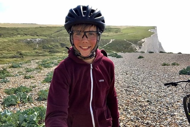 A teenager who cycled 300 miles across Sussex raised hundreds of pounds for a cancer charity.