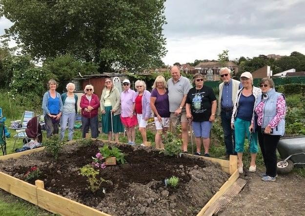 Members of Memory Lane Eastbourne have planted roses at their community allotment at Tutts Barn Lane, in memory of loved ones who had passed away during the Covid-19 pandemic. Memory Lane is a registered charity which provides activities for people with dementia and their carers to enjoy together.
