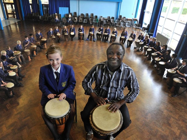 African drumming at Hemel Hempstead School in 2011. Pictured are pupil and teacher, Eleanor Metcalfe, 12, and Ajao Oki.