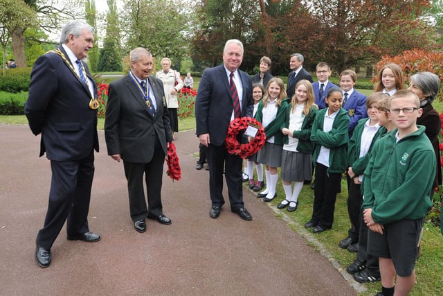 VE Day at Boxmoor Memorial, Hemel Hempstead. Mayor Allan Lawson, Bob Fisher of the Royal British Legion and Mike Penning talking to pupils from Hemel Hempstead School and South Hill School.