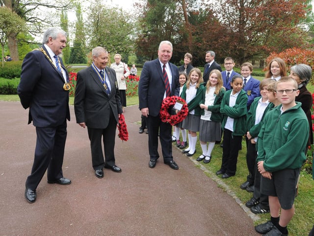 VE Day at Boxmoor Memorial, Hemel Hempstead. Mayor Allan Lawson, Bob Fisher of the Royal British Legion and Mike Penning talking to pupils from Hemel Hempstead School and South Hill School.