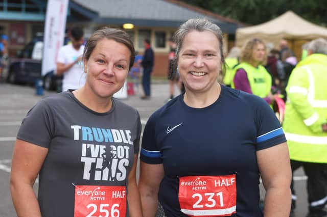 DM21100383a.jpg. Chichester half marathon and 10 mile race. Catherine Pledger, left and Natasha Murch. Photo by Derek Martin Photography and Art. SUS-210310-185041008