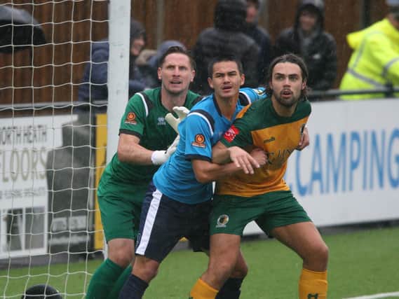Action from Horsham v Eastbourne Borough in the FA Cup third qualifying round. Picture by Derek Martin Photography and Art