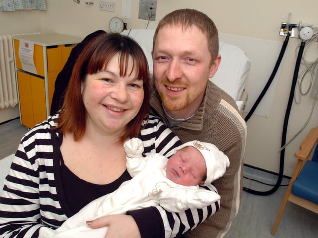 Baby Amy Roberts born in an ambulance on junction 7 of the A14 - with mum Kelly Roberts and dad Scott Roberts of Wellingborough - February 2009
