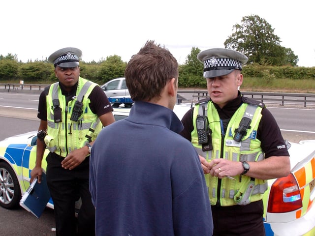 Kettering, Operations Tactical Unit police officers on patrol on A14. 
l-r PC Clive Mutemasango and PC Steve Thorpe in 2009