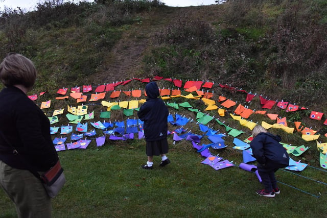 Local children created a rainbow of appreciation for the NHS on a bank in Priory Park