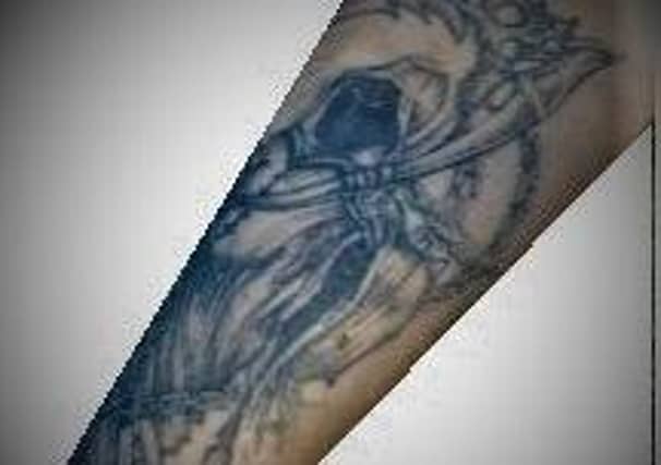 Cambridgeshire police have released images of tattoos in a bid to trace the identity of a man whose body was found in Peterborough.