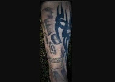 Cambridgeshire police have released images of tattoos in a bid to trace the identity of a man whose body was found in Peterborough.