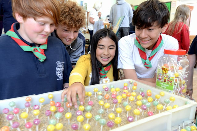 Avalon Lee Francis,11, and members of 2nd Durrington Sea Scout Group at one of the stalls at the Durrington Festival in 2019. Picture: Kate Shemilt ks190295-6