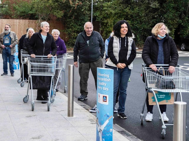 Excited customers get ready to do their first shop at Aldi. Photo: Kirsty Edmonds