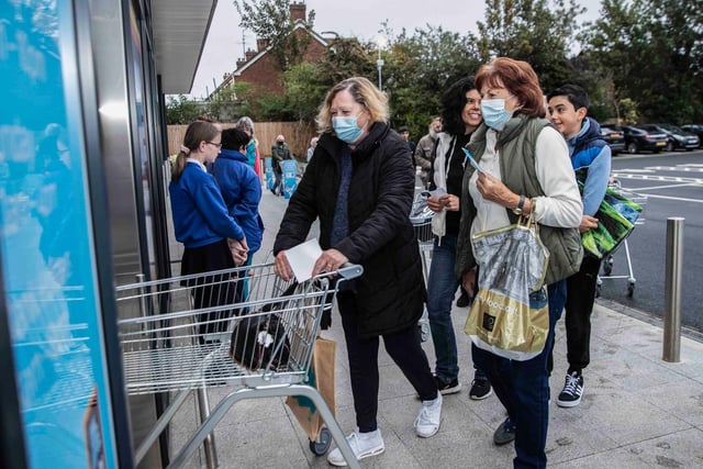 Some of the first shoppers to enter the Aldi store. Photo: Kirsty Edmonds