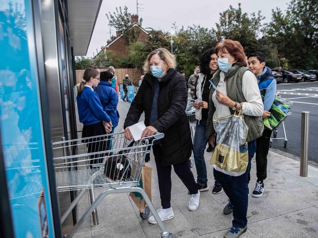 Some of the first shoppers to enter the Aldi store. Photo: Kirsty Edmonds