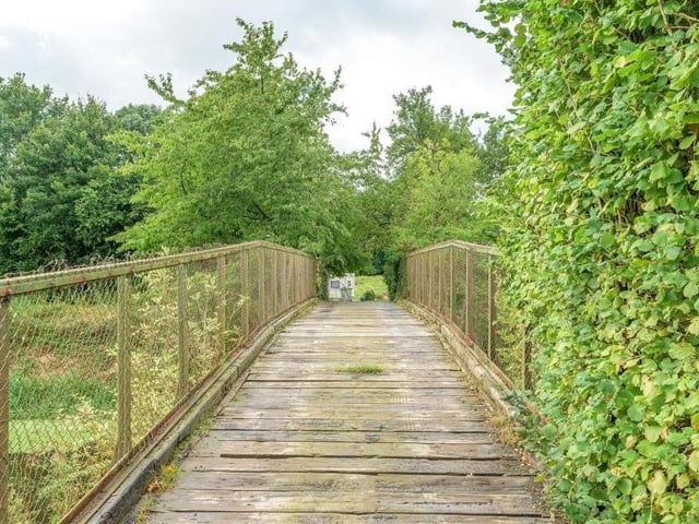 The bridge to the property.