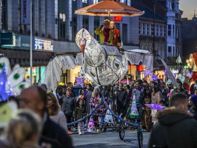 Shanti the bird makes its way along Abington Street during the 2019 parade
