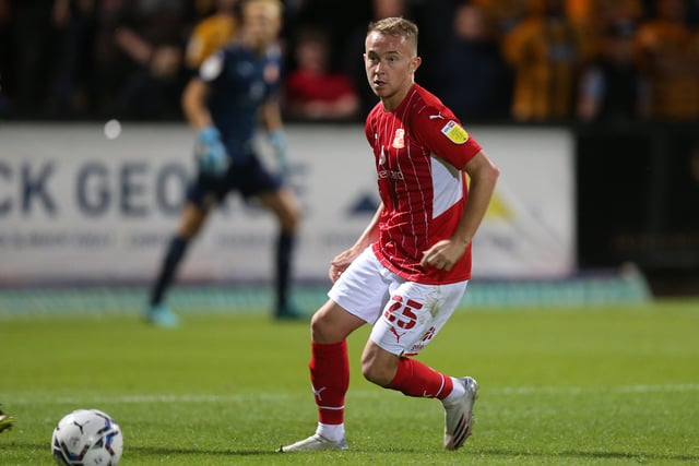 The midfielder dropped into League Two to play for Swindon after his release by Posh and he hasn't regretted it so far. He's started nine League Two games for a club in fifth place and delivered some dominant displays in the centre of the park. Louis Reed is pictured in action for Swindon against Cambridge. Photo: Pete Norton/Getty Images.