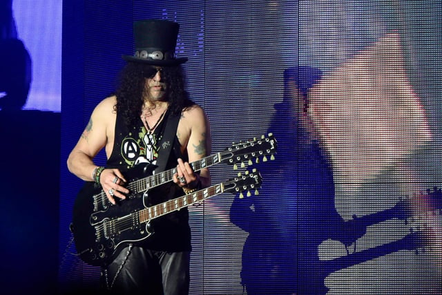 Slash (pictured) is lead guitarist of Guns 'N' Rose rather than a Stoke City defender.  Comedians Nick Hancock and Julian Clary are also Stoke fans. (Photo by Frazer Harrison/Getty Images)