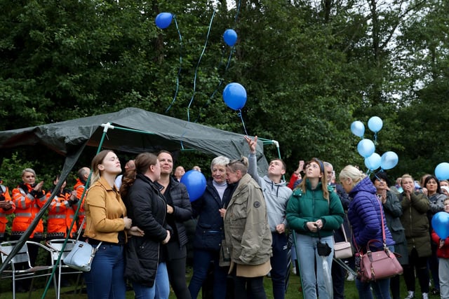 Noah's family released 14 balloons, one for every year of his life, at the vigil yesterday evening.