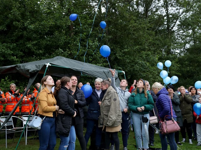 Noah's family released 14 balloons, one for every year of his life, at the vigil yesterday evening.