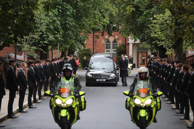 Noah Donohoe's funeral cortege begins to make its way to St. Patrick's Church in Belfast.