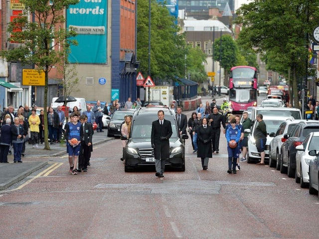 Noah Donohoe's funeral cortege makes its way toward St. Patrick's Church on Wednesday morning.