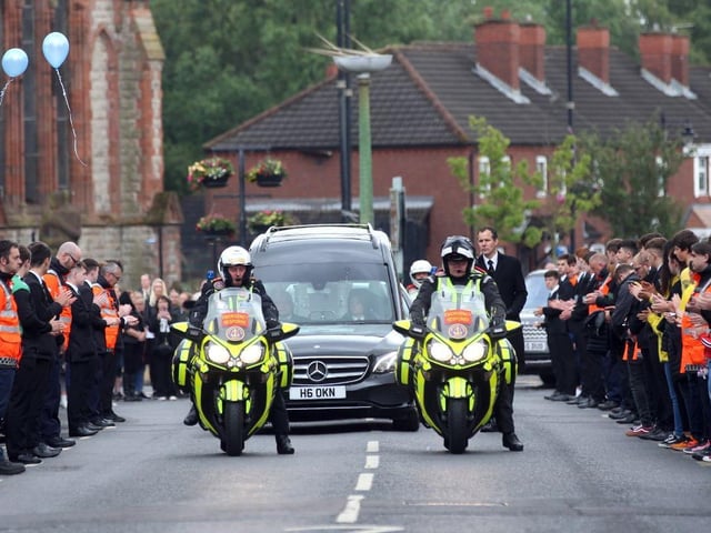 The funeral cortege received a police escort to the church in Belfast.